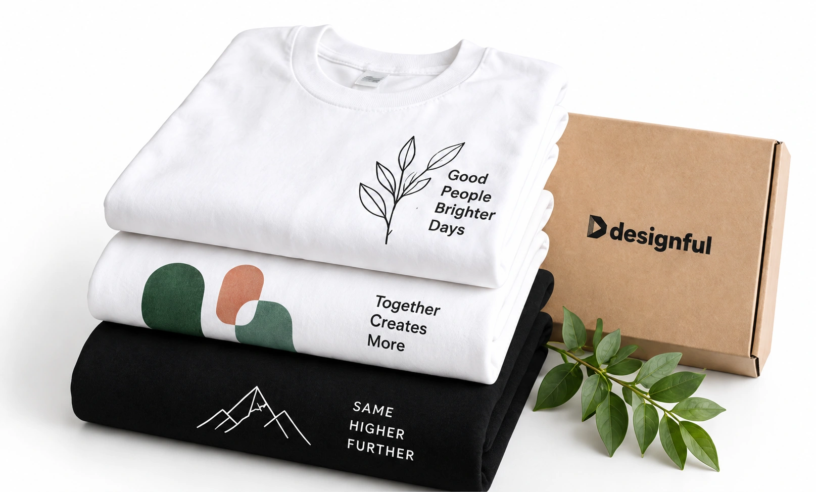 Folded black and white printed T-shirts with a Designful box